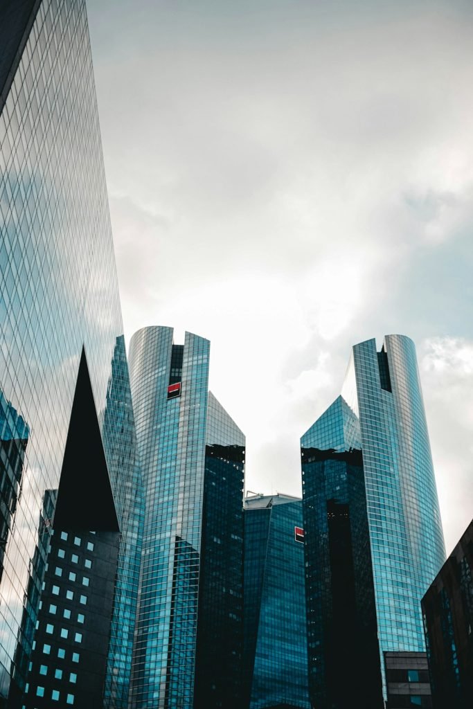 a-group-of-tall-buildings-sitting-next-to-each-other-yv9xkmqw0nm a-group-of-tall-buildings-sitting-next-to-each-other-yv9xkmqw0nm